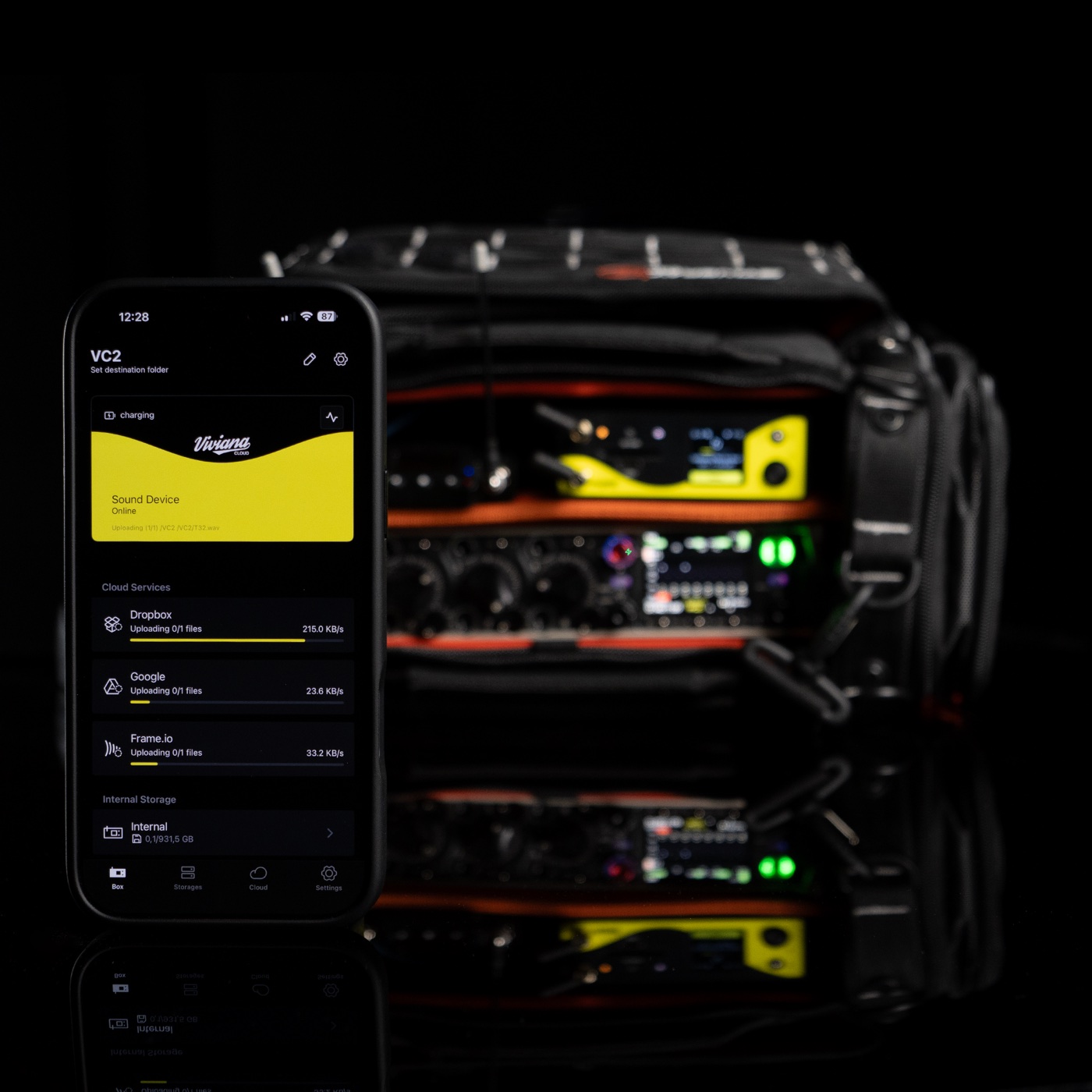 The Viviana Cloud app on a phone next to the device in a sound bag